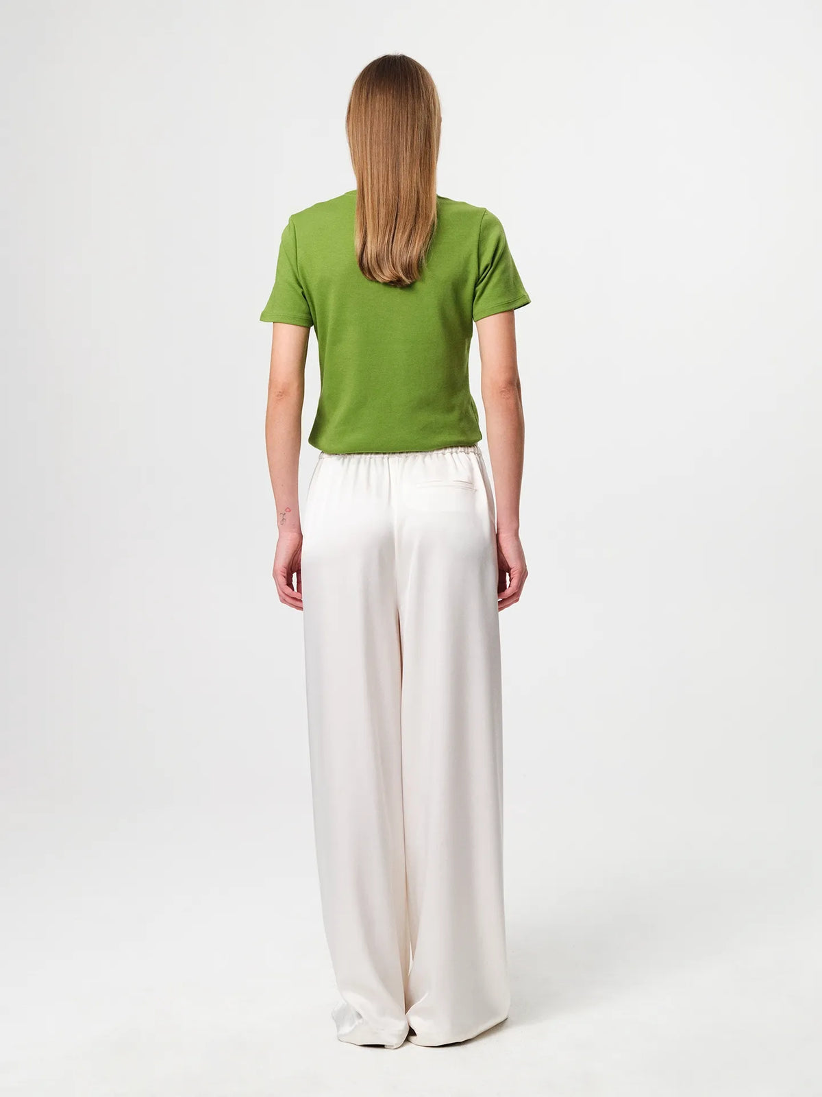 Julie Josephine Agnes Tee Tulip Green: relaxed fitted t shirt in tulip green made from soft Italian cotton jersey, designed as the perfect everyday tee and a seasonless wardrobe essential, effortless and versatile with a clean minimal silhouette, crafted for comfort and durability so it can be worn and washed endlessly.