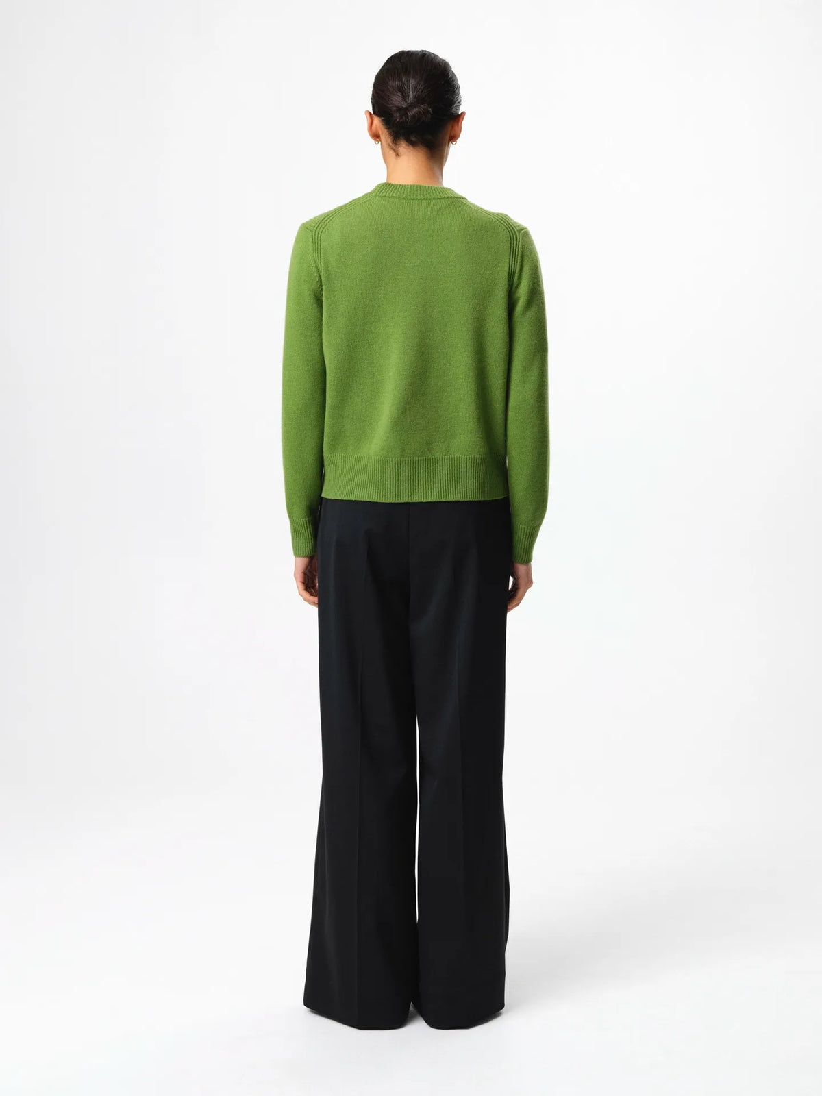 Julie Josephine Alma Sweater Tulip Green: soft breathable knit sweater in a tulip green shade made in a 90% wool and 10% cashmere blend, designed with a clean crew neckline, subtle relaxed shoulders, long sleeves, and a flattering regular fit with gentle structure, a refined everyday essential that looks simple, comfortable, and elevated.