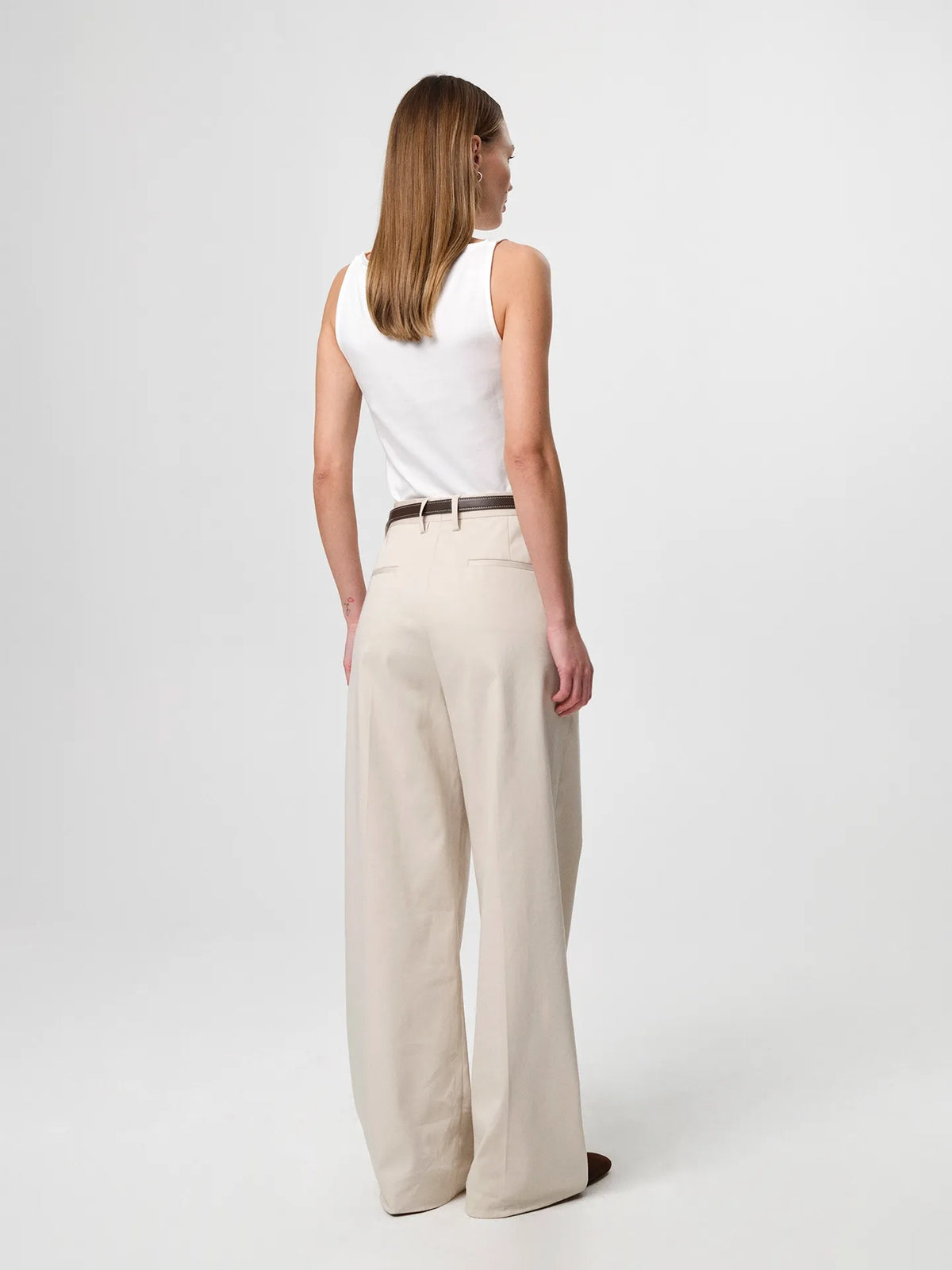 Boatneck Top in white, a classic sleeveless top in soft Italian cotton-blend jersey with a subtle raised boat neckline and a cropped, fitted silhouette.