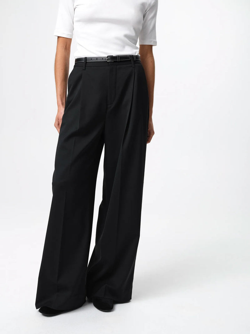 Cecilia Trouser in a soft, structured wool-blend twill with wide legs, front pleats, side pockets and belt loops.