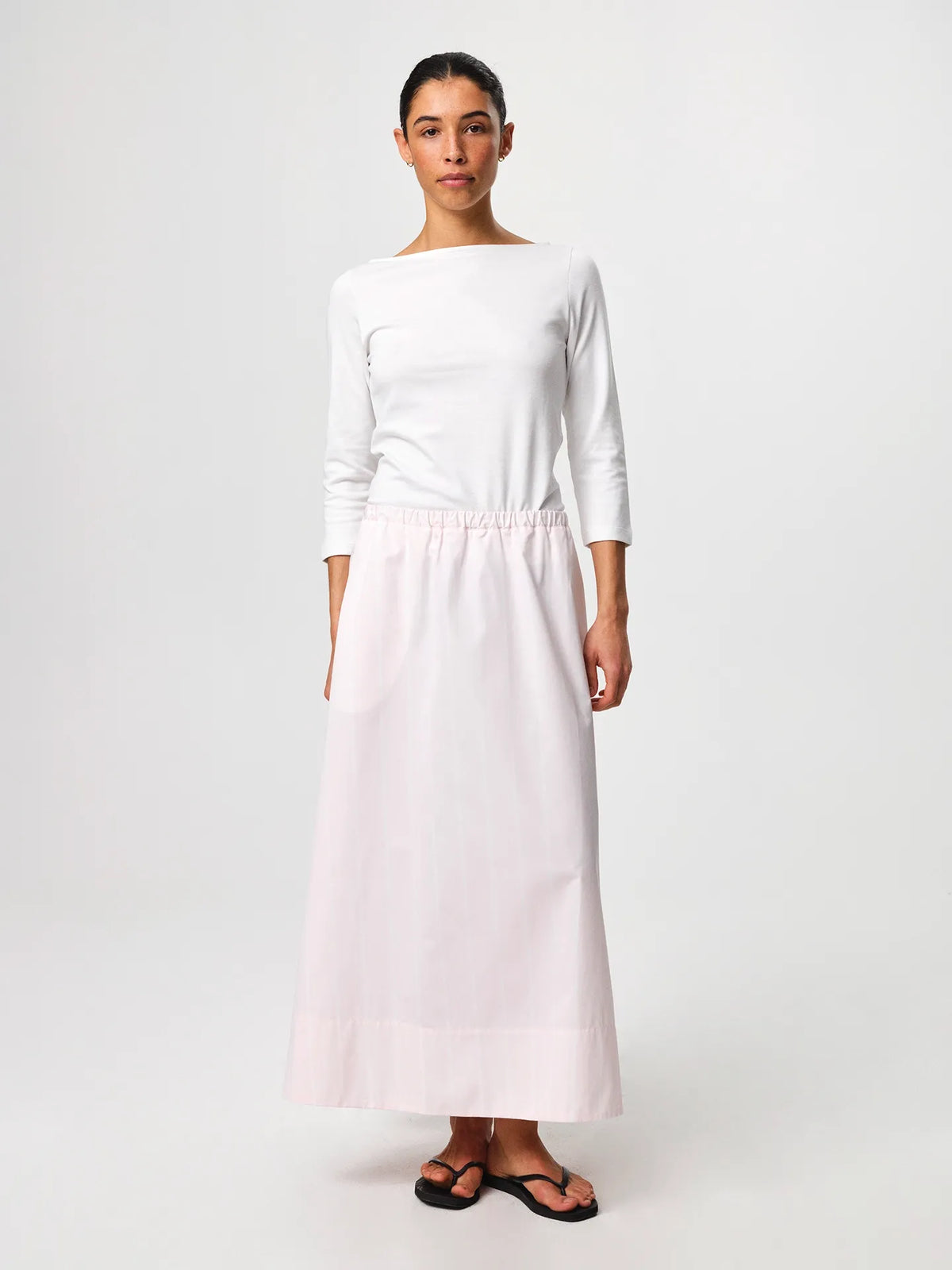 Julie Josephine Nina Half Sleeve White: fitted white half sleeve top made from a 94% Italian pima cotton and 6% polyamide blend, crafted in a smooth stretchy jersey for a soft supportive feel, designed as a versatile wardrobe essential to wear on its own or as a clean layering base under shirts, blazers, and knitwear.