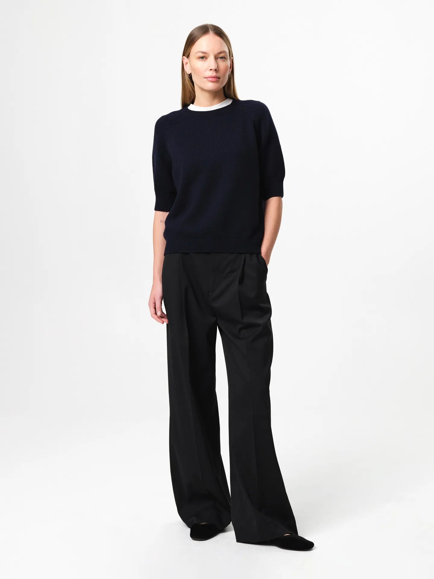Pauline Top in dark navy, crafted in a balanced wool–cotton blend with a refined crew neckline, half sleeves and a clean, heavy structured knit silhouette.
