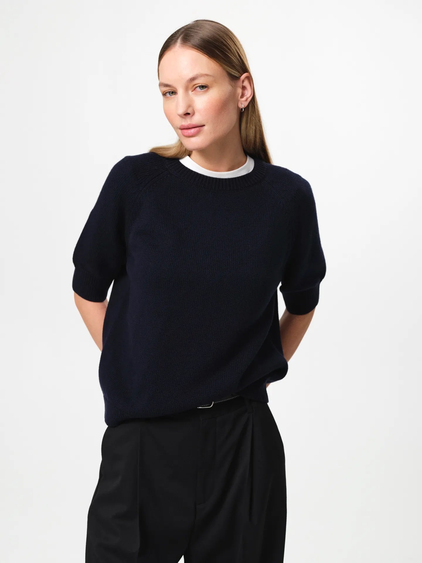 Pauline Top in dark navy, crafted in a balanced wool–cotton blend with a refined crew neckline, half sleeves and a clean, heavy structured knit silhouette.