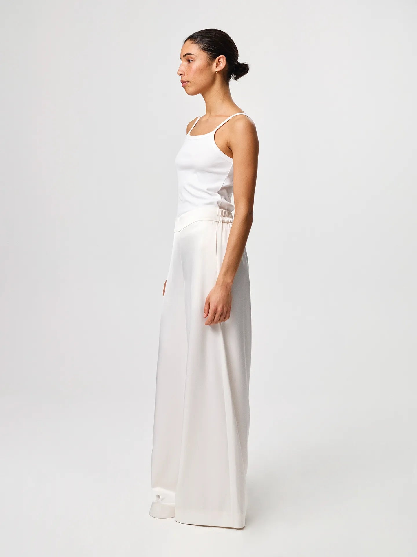 Tinki Rib Top in white, crafted from Italian Pima cotton-blend rib jersey with a slim fit and clean sleeveless silhouette.