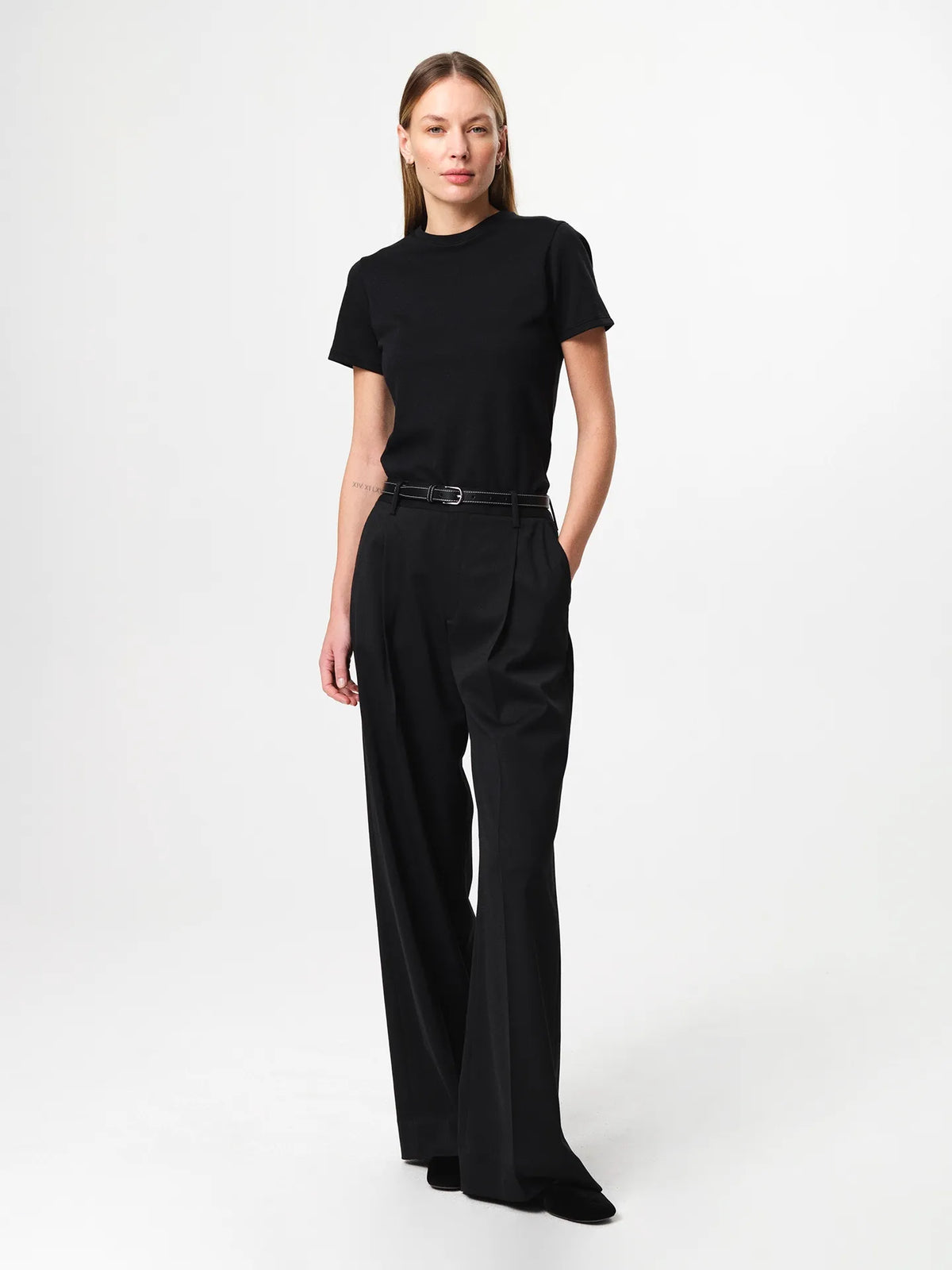 Agnes T-shirt in black, a soft organic cotton jersey tee with a classic crew neckline and relaxed fit.