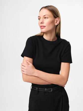Agnes T-shirt in black, a soft organic cotton jersey tee with a classic crew neckline and relaxed fit.