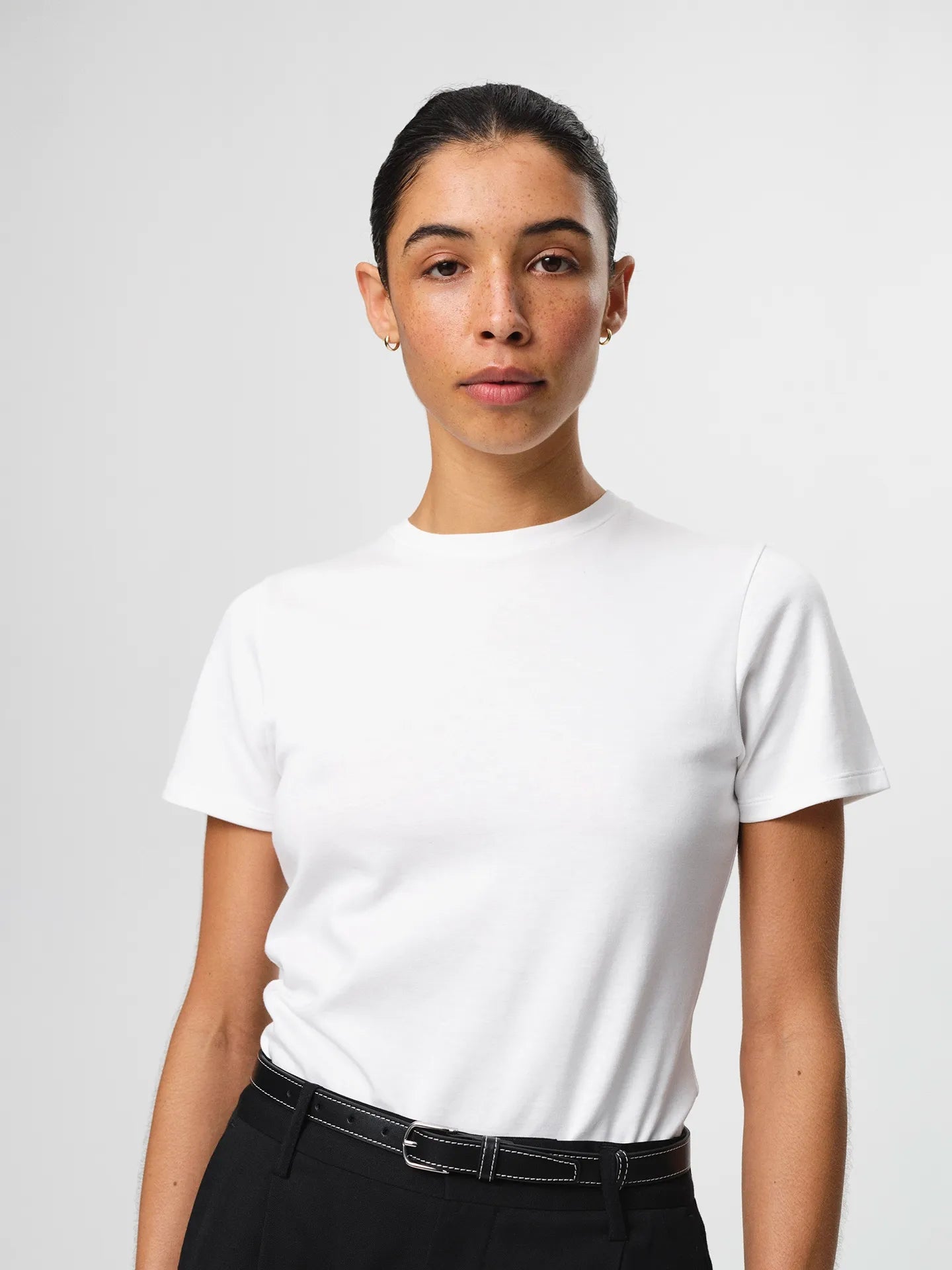 Agnes T-shirt in white, a soft organic cotton jersey tee with a classic crew neckline and relaxed fit.