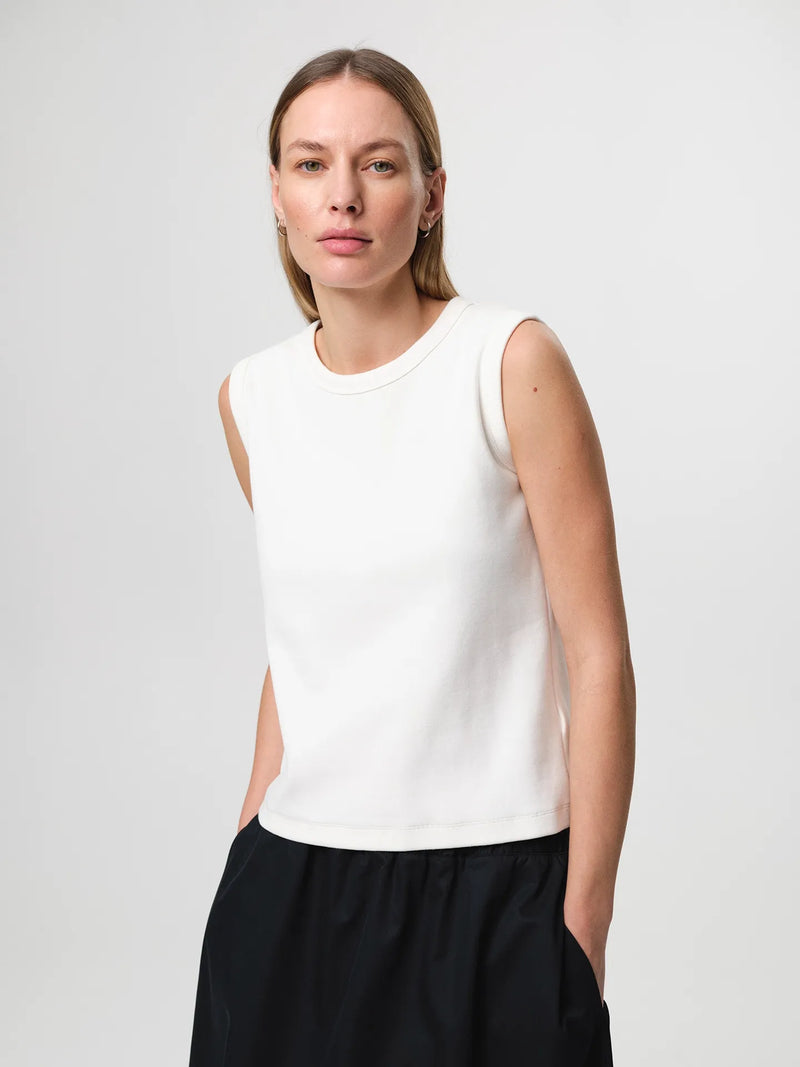 Julie Josephine Alba Top White: heavy rib cotton top in white with a clean minimal silhouette, designed as an everyday essential in a structured ribbed jersey that holds its shape, easy to style on its own or layered under shirts, blazers, and knitwear.