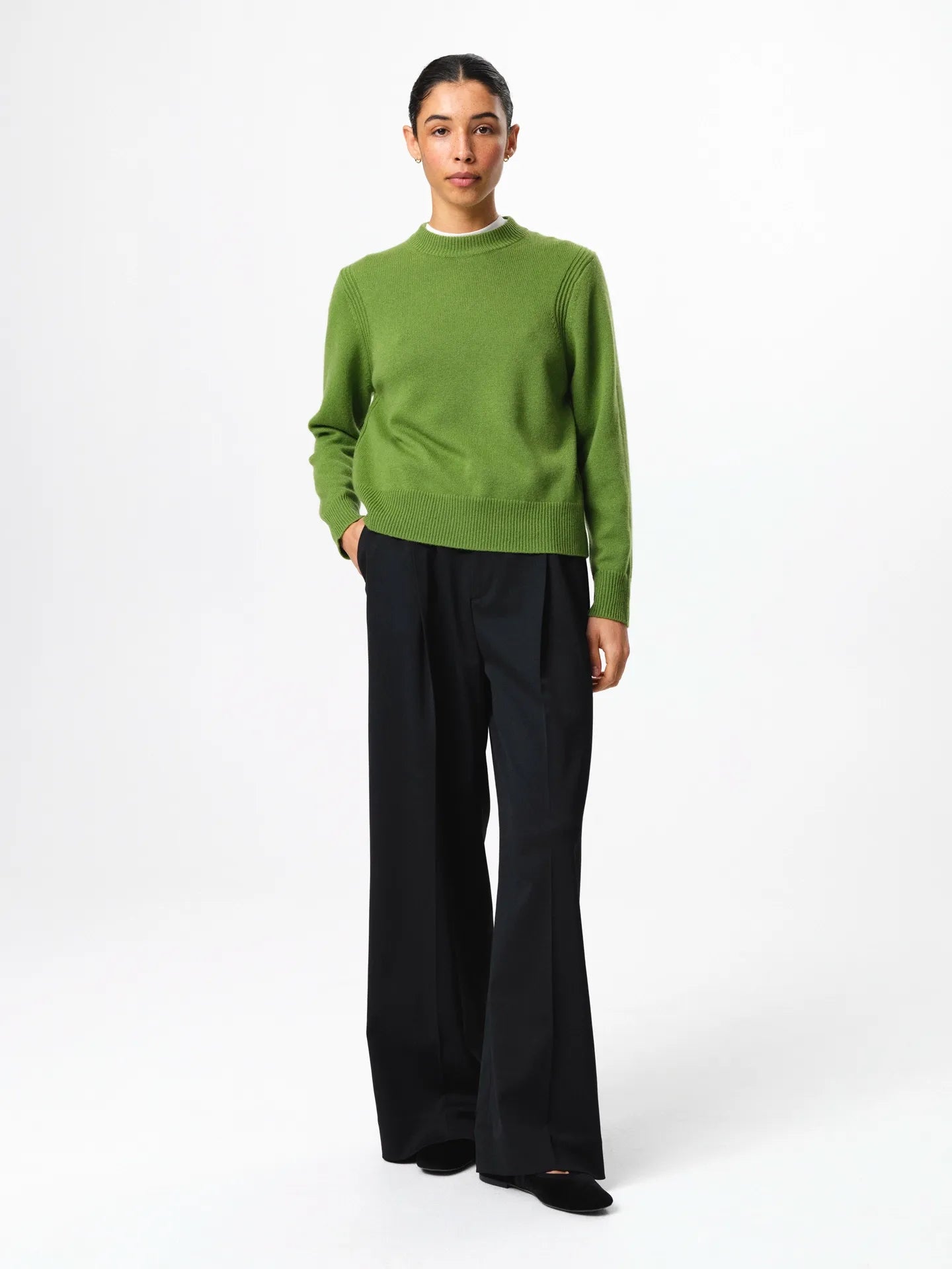 Julie Josephine Alma Sweater Tulip Green: soft breathable knit sweater in a tulip green shade made in a 90% wool and 10% cashmere blend, designed with a clean crew neckline, subtle relaxed shoulders, long sleeves, and a flattering regular fit with gentle structure, a refined everyday essential that looks simple, comfortable, and elevated.