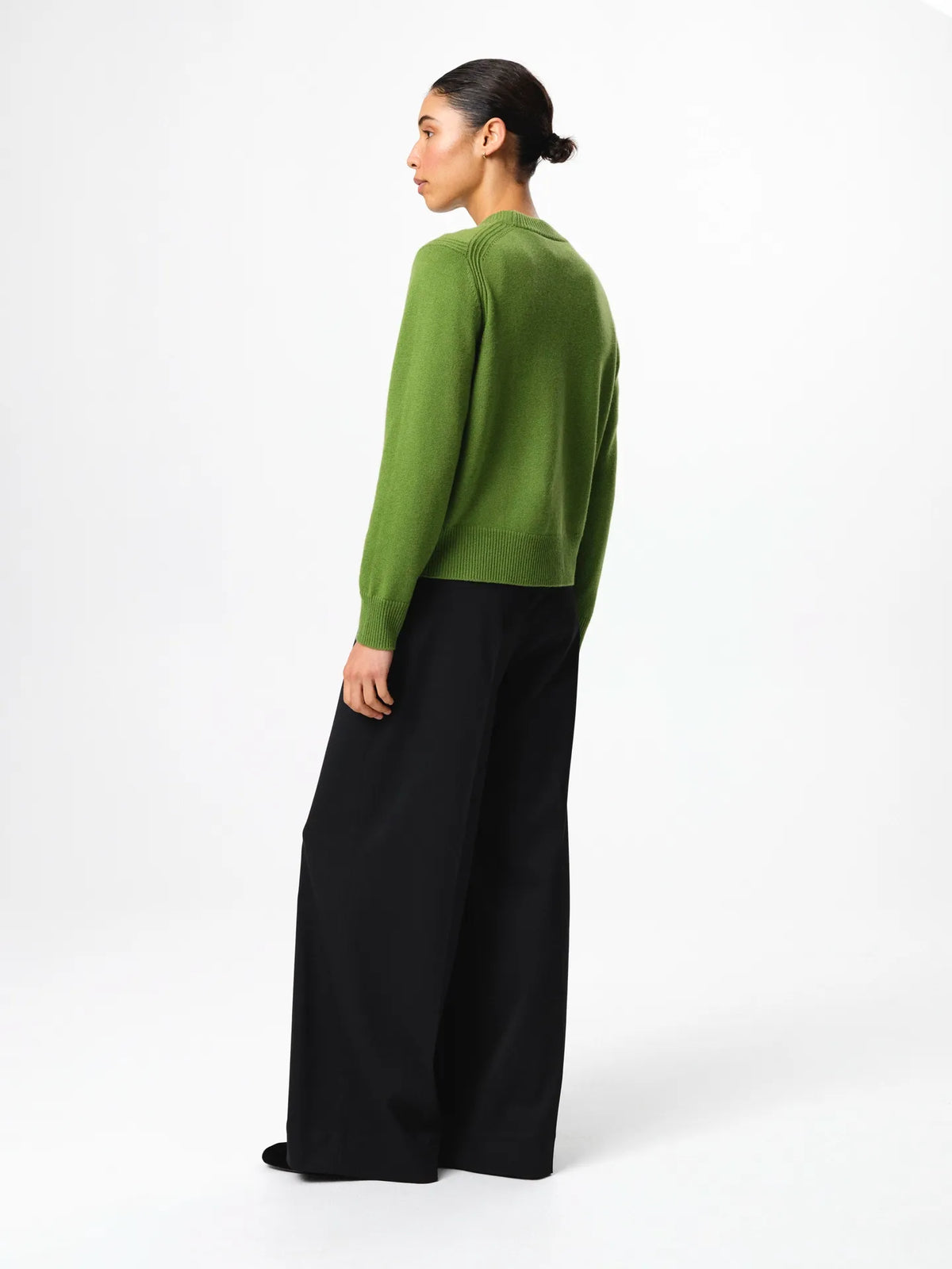 Julie Josephine Alma Sweater Tulip Green: soft breathable knit sweater in a tulip green shade made in a 90% wool and 10% cashmere blend, designed with a clean crew neckline, subtle relaxed shoulders, long sleeves, and a flattering regular fit with gentle structure, a refined everyday essential that looks simple, comfortable, and elevated.