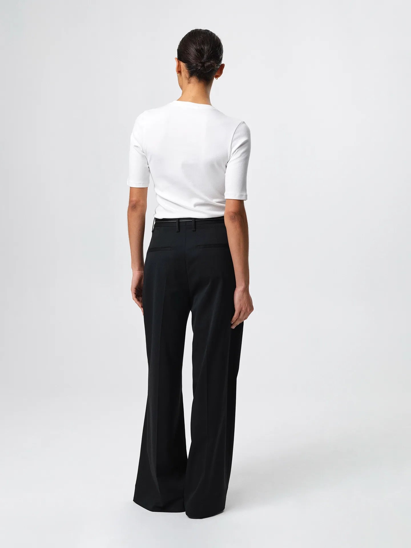 Cecilia Trouser in a soft, structured wool-blend twill with wide legs, front pleats, side pockets and belt loops.