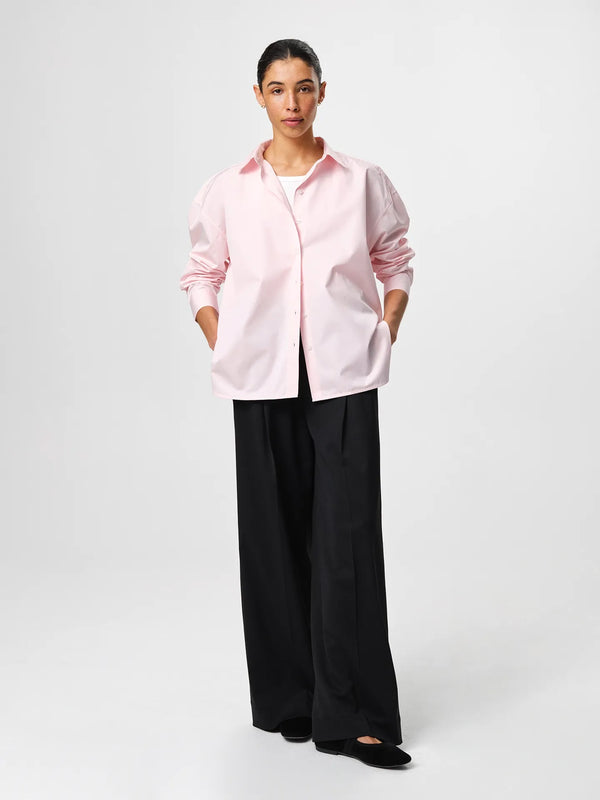 Julie Josephine Edwina Shirt Peony Pink: oversized tailored shirt in peony pink made from crisp 100% cotton poplin, designed with a sharp collar, dropped shoulders, and a gently curved hem for a fresh modern silhouette, an everyday wardrobe essential styled for effortless pairing with tailored trousers or layered over a fitted top.