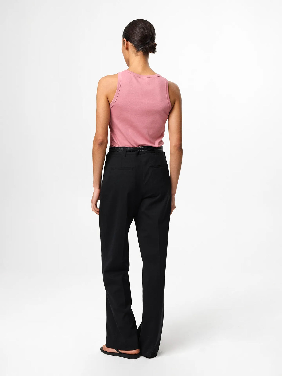 Julie Josephine Ella Rib Top Rosy Pink: slim fit ribbed top in rosy pink made from a 94% Italian pima cotton and 6% polyamid blend, crafted in signature cotton blend rib jersey with a smooth stretchy feel, designed as a versatile wardrobe essential to wear on its own or as an easy layering piece under shirts, knits, and blazers.