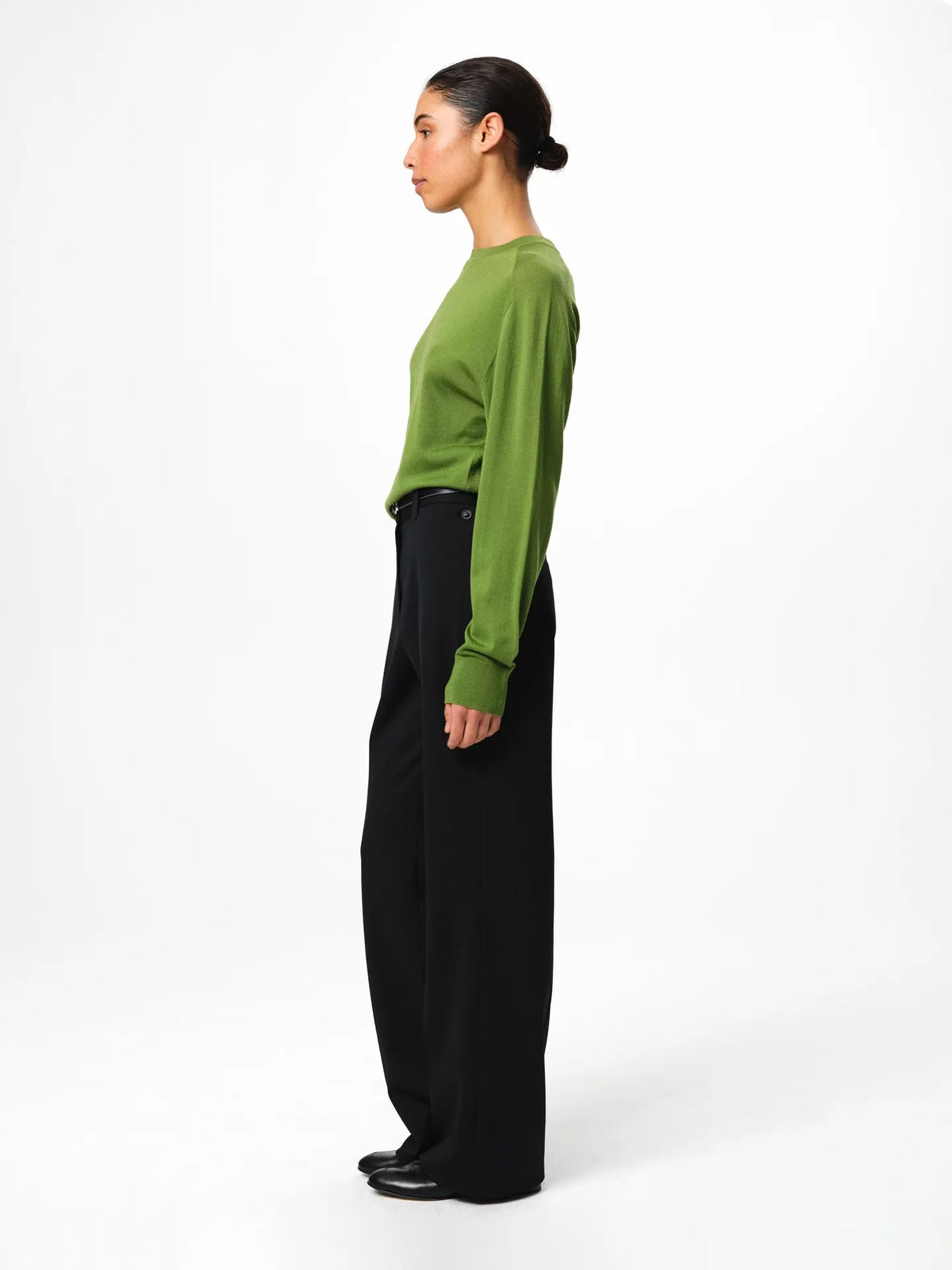 Julie Josephine Hanne Sweater Tulip Green: classic round neck sweater in tulip green, knitted in 100% fine merino wool for lightweight warmth and a soft feel, clean minimal silhouette with long sleeves and ribbed trims, styled as an everyday knit that works on its own or layered over a T shirt.