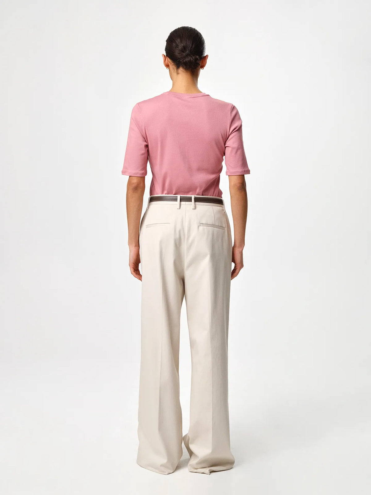 Julie Josephine Marianne Rib Tee Rosy Pink: capsule wardrobe rib tee in rosy pink made from 94% Italian pima cotton and 6% polyamide, crafted in soft structured Italian cotton rib jersey with a slim flattering fit, classic round neckline and elbow length sleeves that balance comfort and shape, designed for effortless versatility worn on its own or layered under shirts, knits, and blazers.