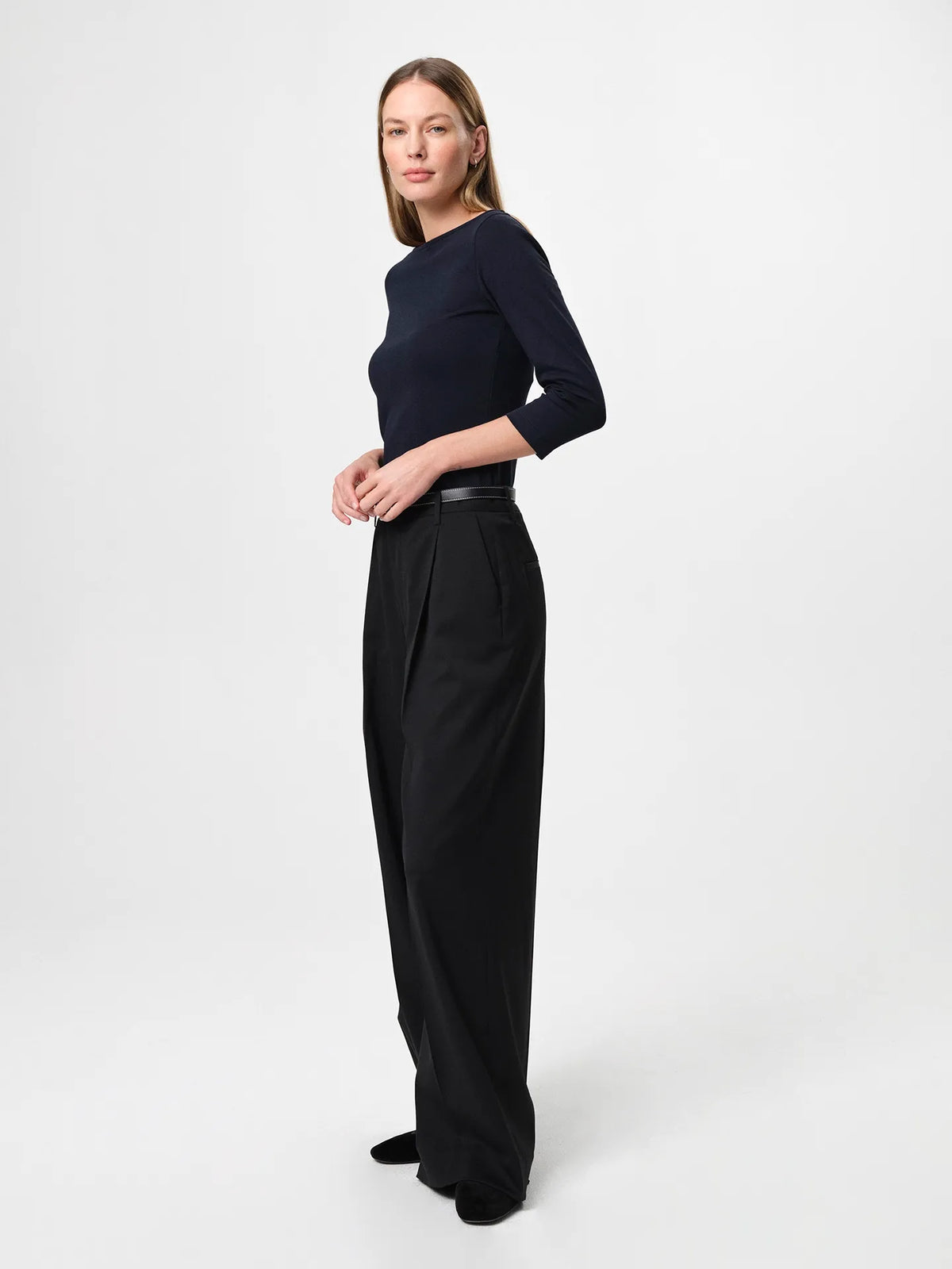 Julie Josephine Nina Half Sleeve Dark Navy: fitted half sleeve top in dark navy made from a 94% Italian pima cotton and 6% polyamide blend, crafted in a smooth stretchy jersey for a soft supportive feel, designed as a versatile wardrobe essential to wear on its own or as an easy layering base under shirts, blazers, and knitwear.