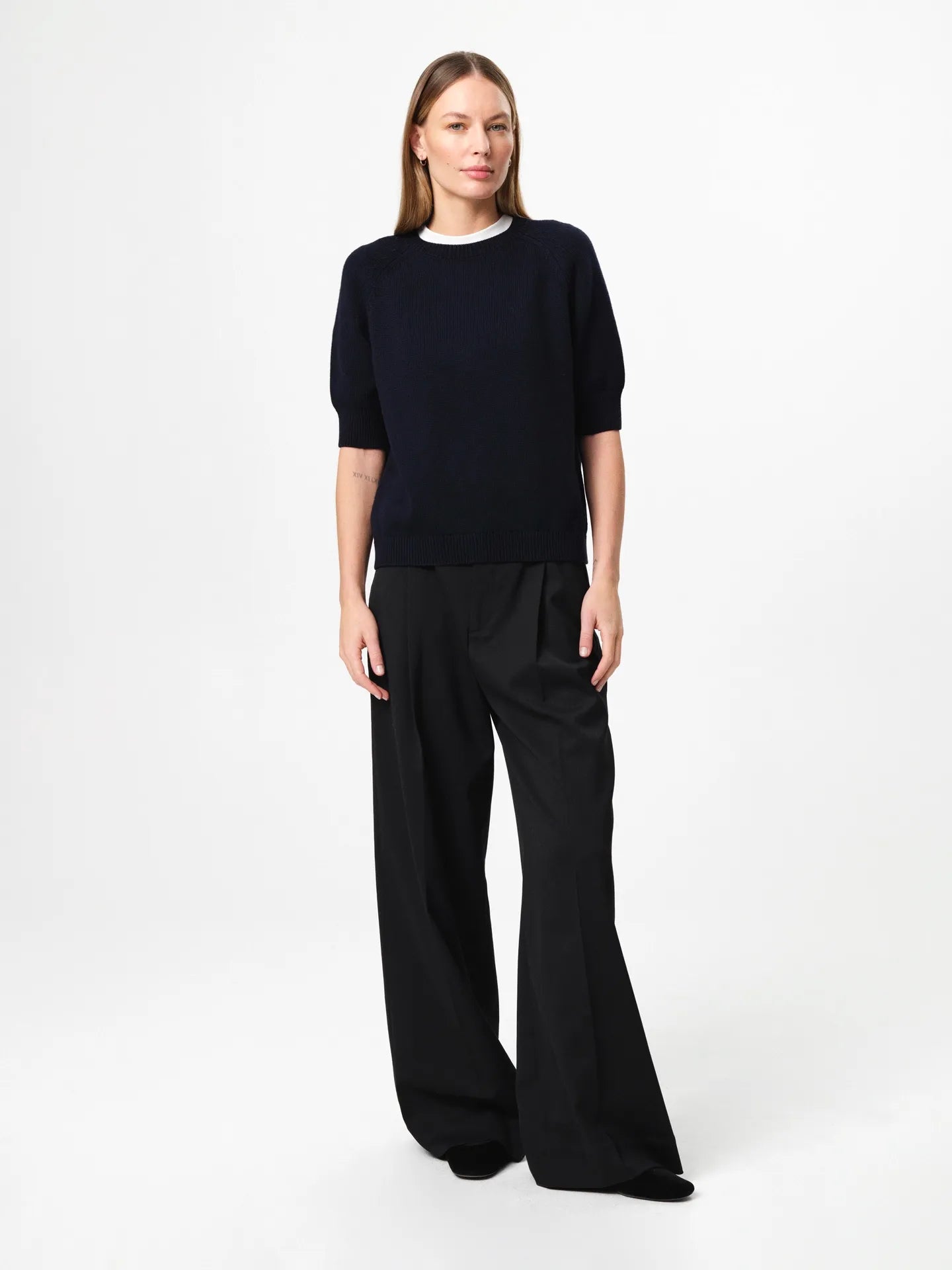 Pauline Top in dark navy, crafted in a balanced wool–cotton blend with a refined crew neckline, half sleeves and a clean, heavy structured knit silhouette.