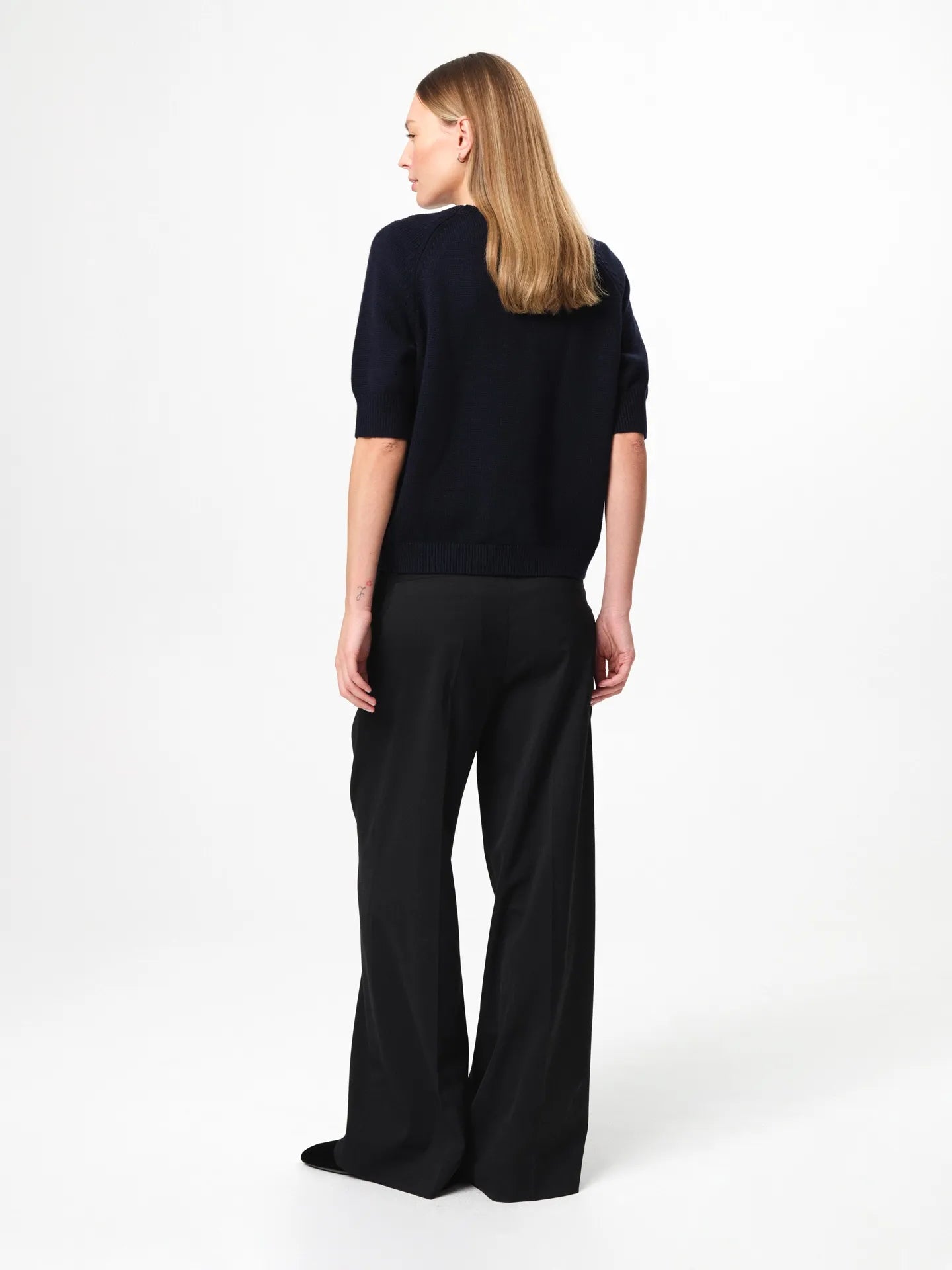 Pauline Top in dark navy, crafted in a balanced wool–cotton blend with a refined crew neckline, half sleeves and a clean, heavy structured knit silhouette.