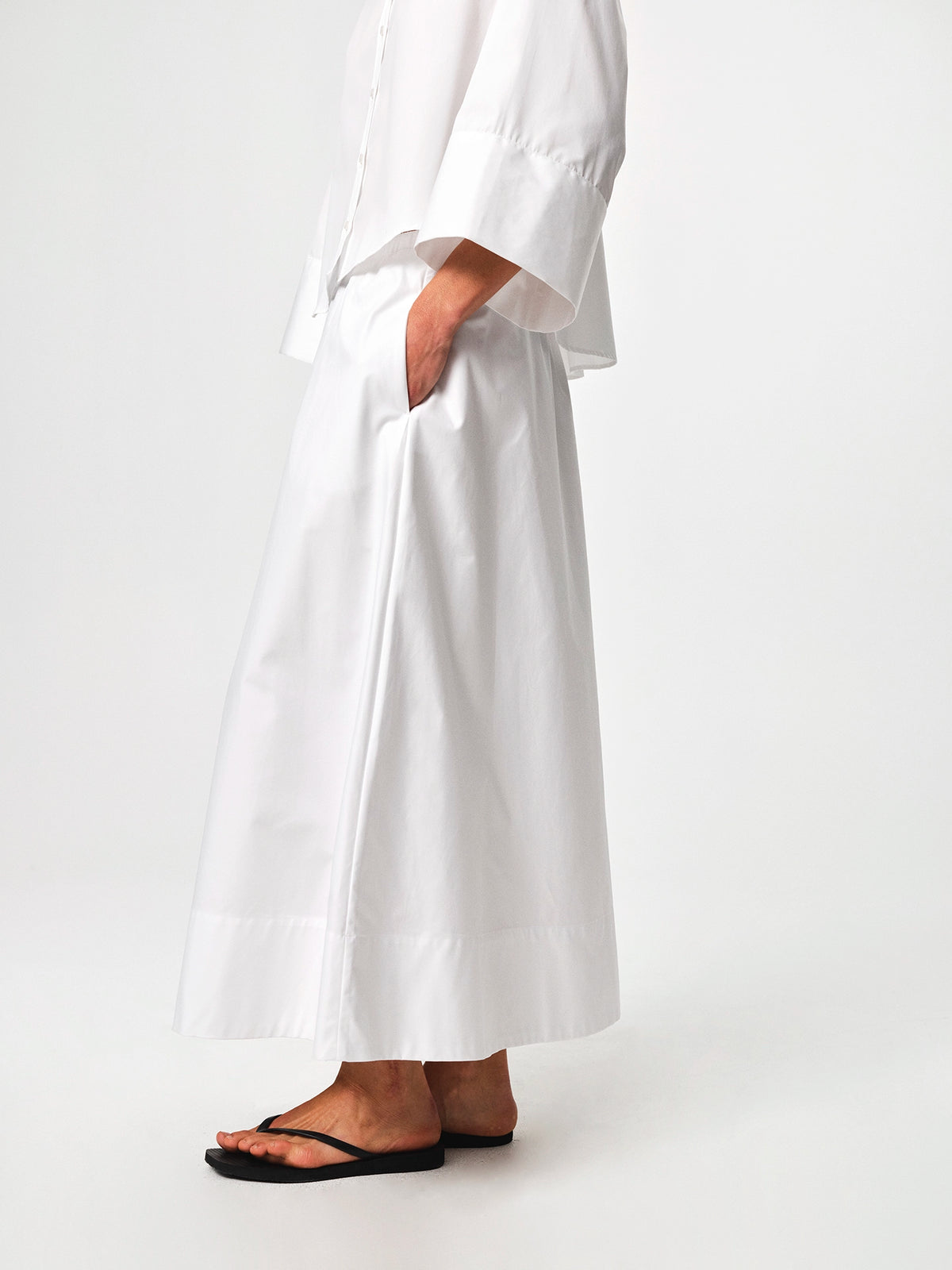 Julie Josephine Anja Shirt White: crisp white shirt made from 100% cotton with a clean classic silhouette, designed as a versatile wardrobe staple that works polished on its own or layered under knitwear and outerwear for effortless everyday styling.