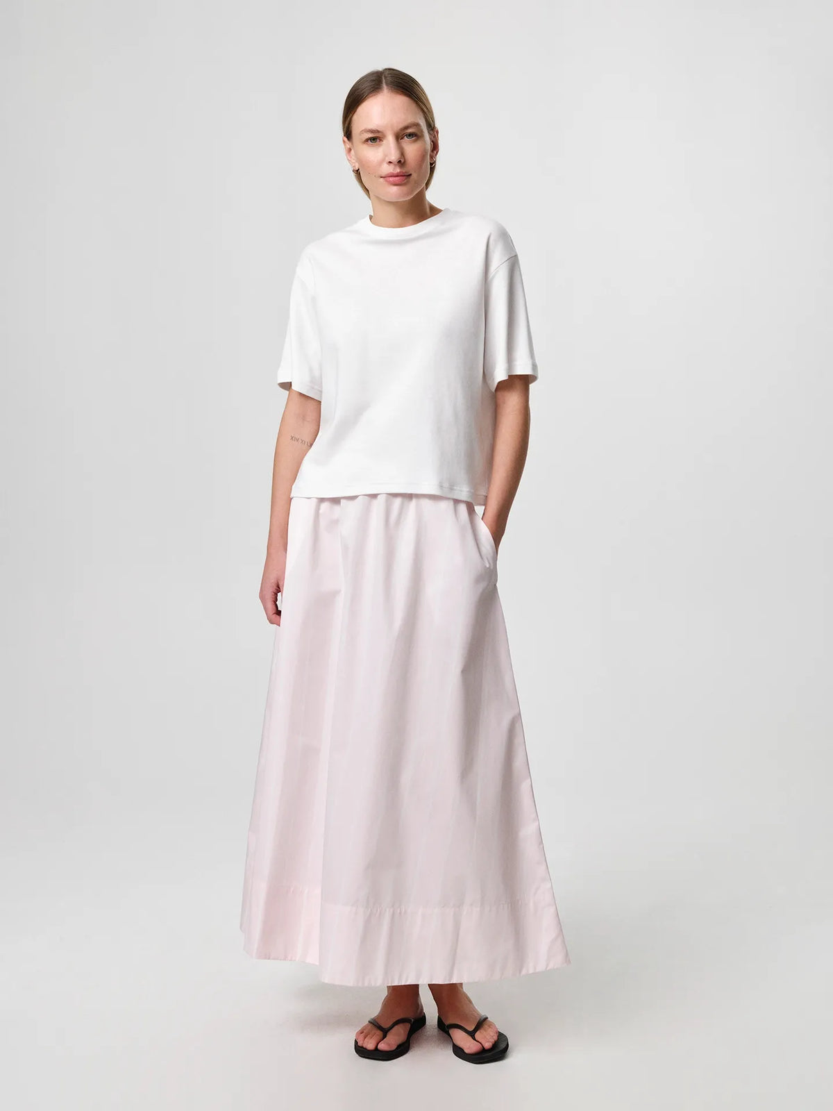 Stella T-shirt in white, crafted from soft organic cotton jersey with a classic crew neckline and relaxed fit.