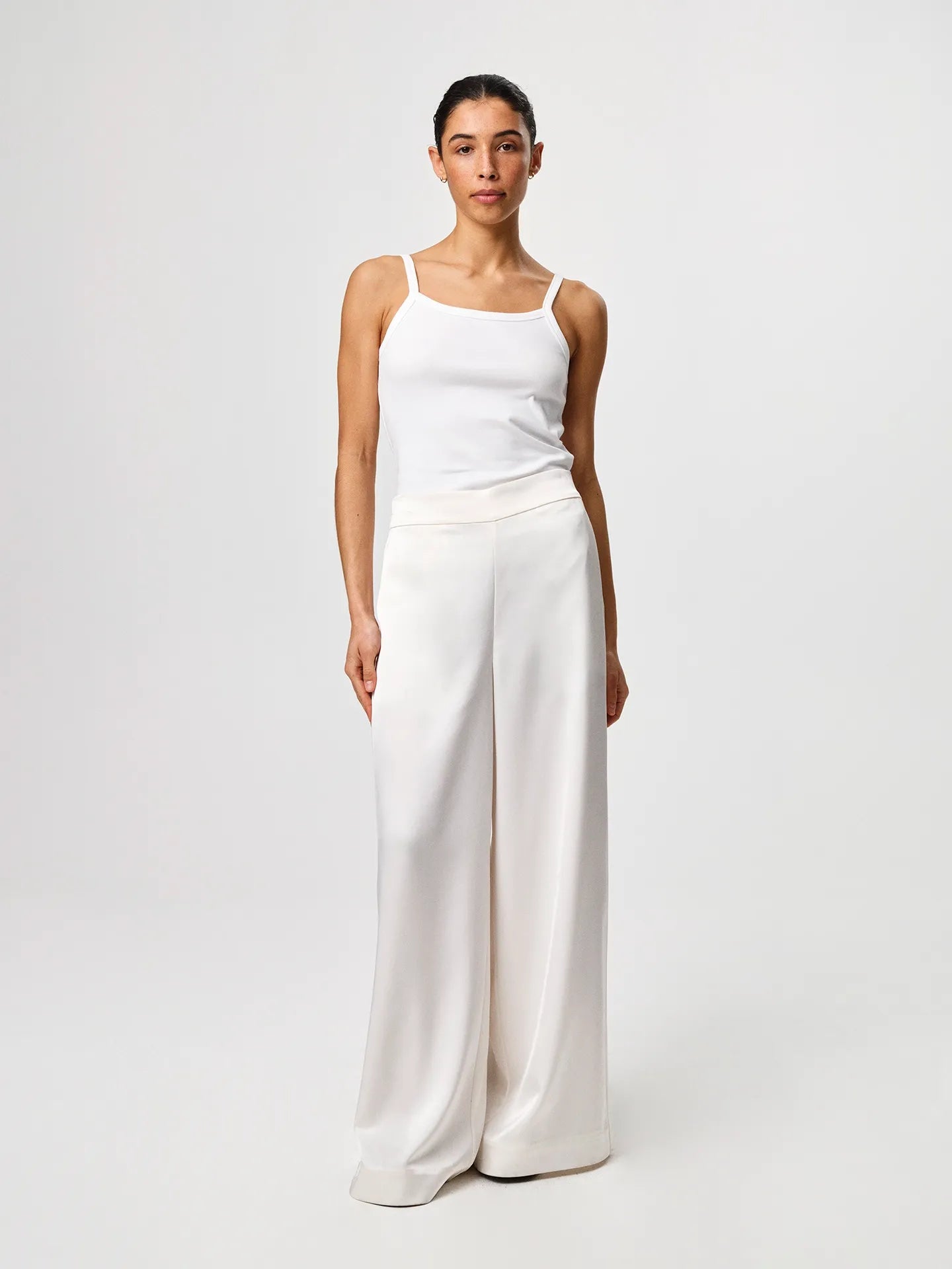 Tinki Rib Top in white, crafted from Italian Pima cotton-blend rib jersey with a slim fit and clean sleeveless silhouette.