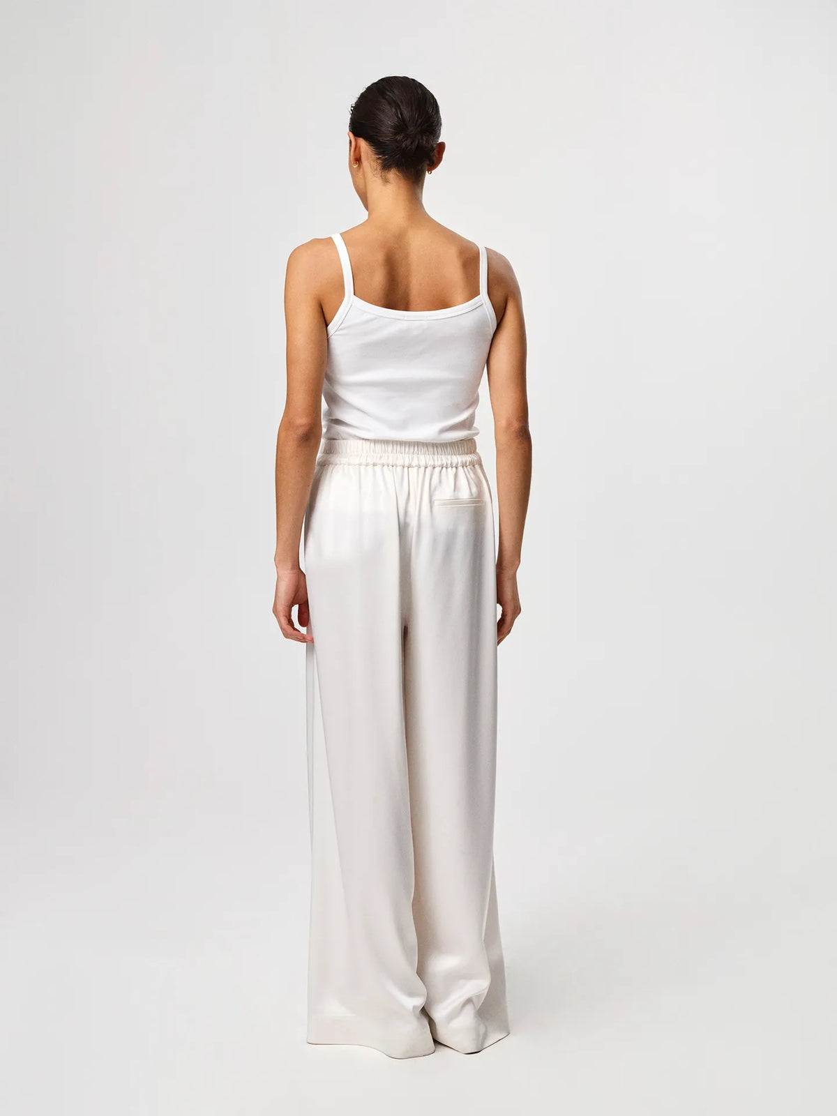Tinki Rib Top in white, crafted from Italian Pima cotton-blend rib jersey with a slim fit and clean sleeveless silhouette.